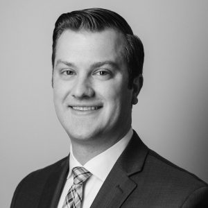 Sean M. Corpstein headshot black & white