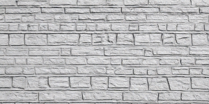 A stone wall black and white